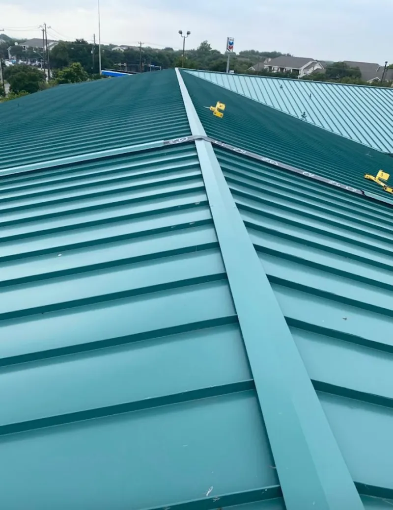 Green commercial metal roof ridge and valley for Metal Roof Repair in Glencoe